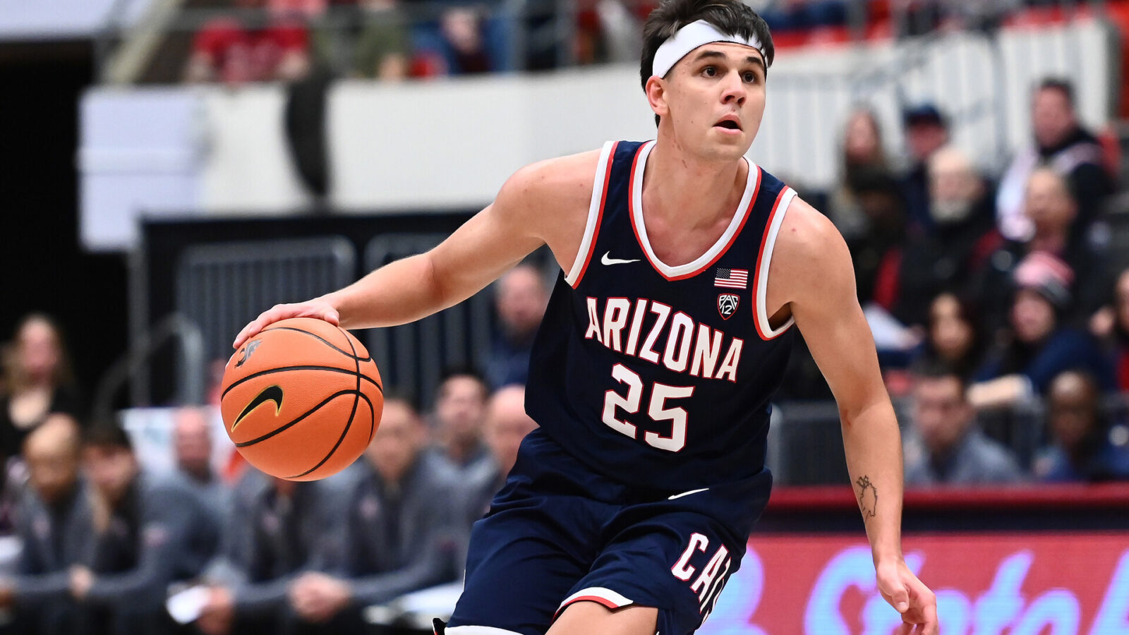 Arizona Wildcats guard Kerr Kriisa (25) controls the ball against the Washington State Cougars in the first half at Friel Court at Beasley Coliseum.