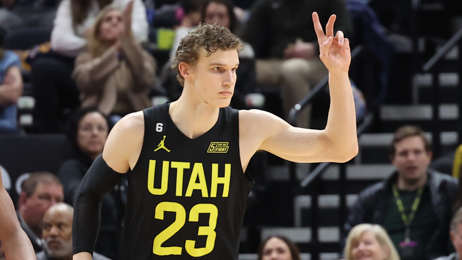 Utah Jazz forward Lauri Markkanen (23) reacts to a play against the Toronto Raptors in the second quarter at Vivint Arena.