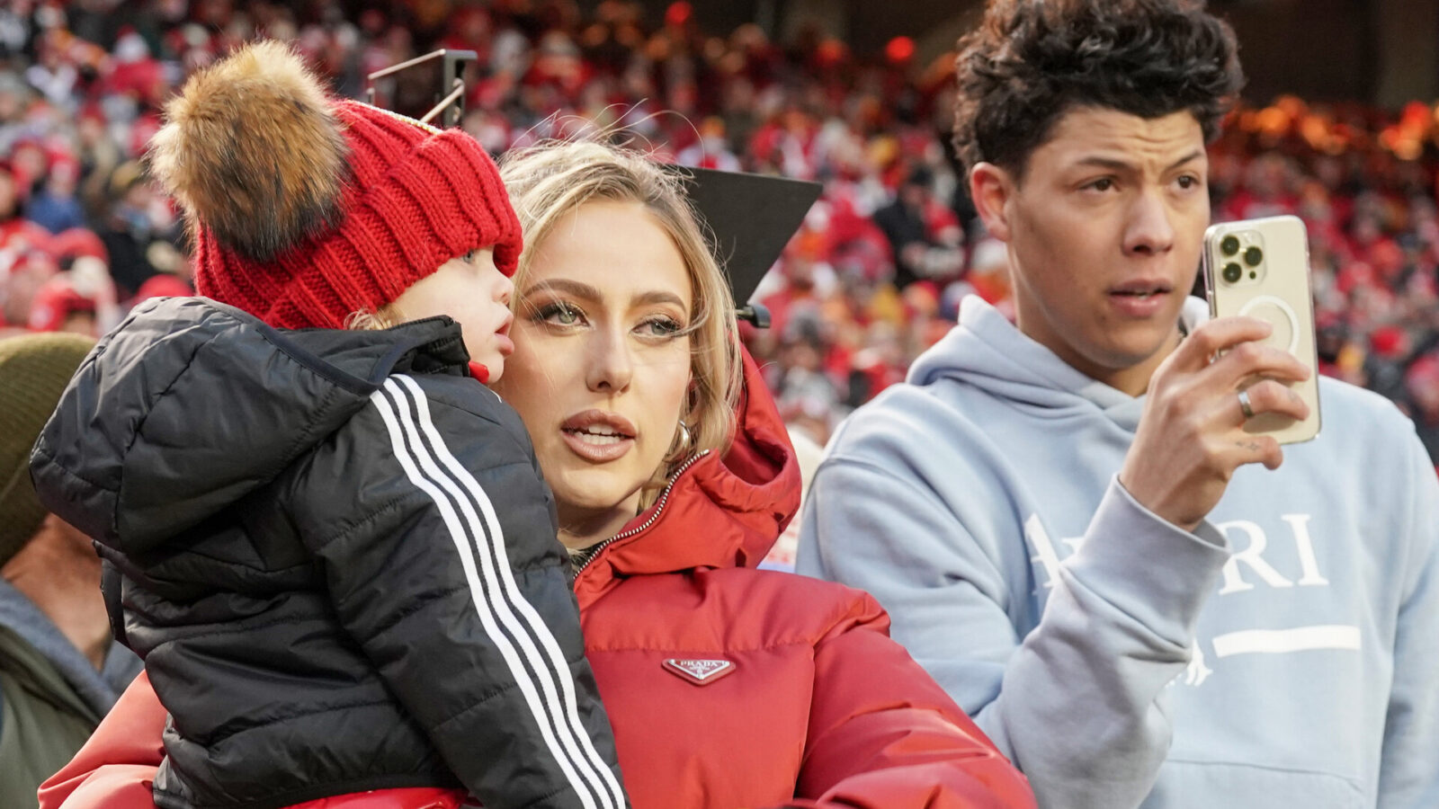 Kansas City Chiefs quarterback Patrick Mahomes (not pictured) wife Brittney, daughter Sterling, and brother Jackson watches the team warm up against the Cincinnati Bengals prior to the AFC Championship game at GEHA Field at Arrowhead Stadium.