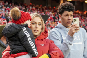 Kansas City Chiefs quarterback Patrick Mahomes (not pictured) wife Brittney, daughter Sterling, and brother Jackson watches the team warm up against the Cincinnati Bengals prior to the AFC Championship game at GEHA Field at Arrowhead Stadium.