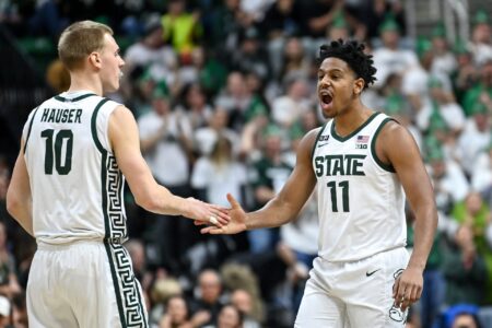 Michigan State's Joey Hauser, left, celebrates his score with A.J. Hoggard during the first half in the game against Maryland on Tuesday, Feb. 7, 2023, at the Breslin Center in East Lansing.