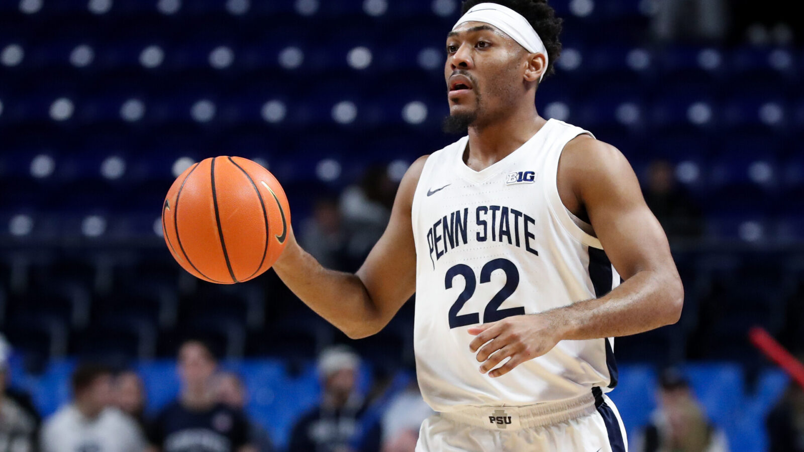 Penn State Nittany Lions guard Jalen Pickett (22) dribbles the ball during the first half against the Illinois Fighting Illini at Bryce Jordan Center.