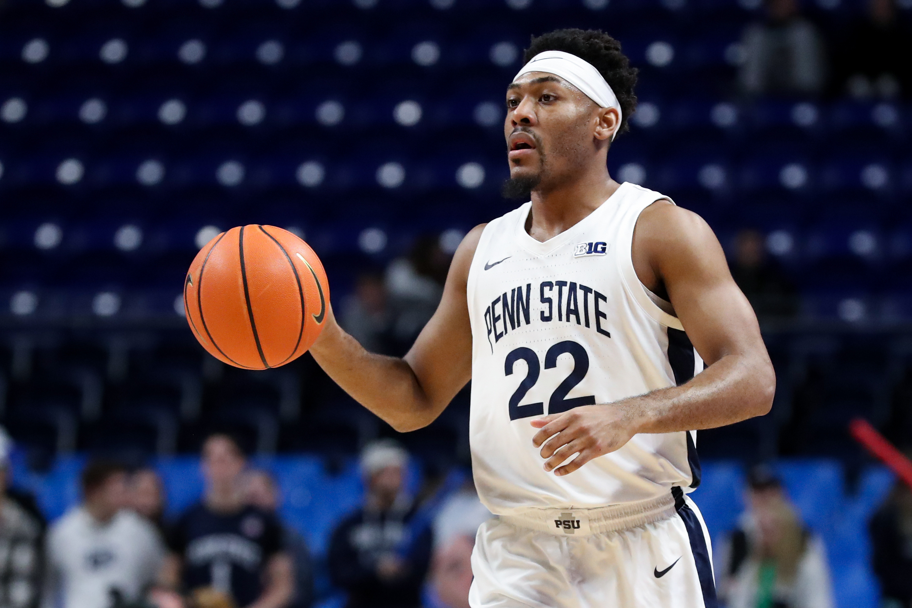 Penn State Nittany Lions guard Jalen Pickett (22) dribbles the ball during the first half against the Illinois Fighting Illini at Bryce Jordan Center.