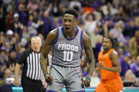 TCU Horned Frogs guard Damion Baugh (10) celebrates after he dunks the ball against the Oklahoma State Cowboys during the first half at the Ed and Rae Schollmaier Arena.