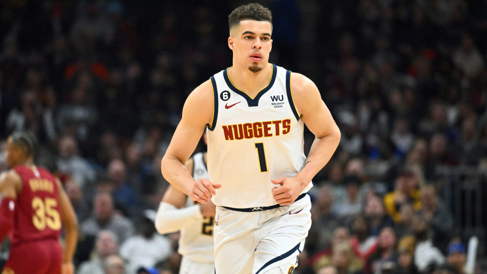 Michael Porter Jr. #1 of the Denver Nuggets runs back on defense during the third quarter against the Cleveland Cavaliers at Rocket Mortgage Fieldhouse on February 23, 2023 in Cleveland, Ohio. The Nuggets defeated the Cavaliers 115-109.