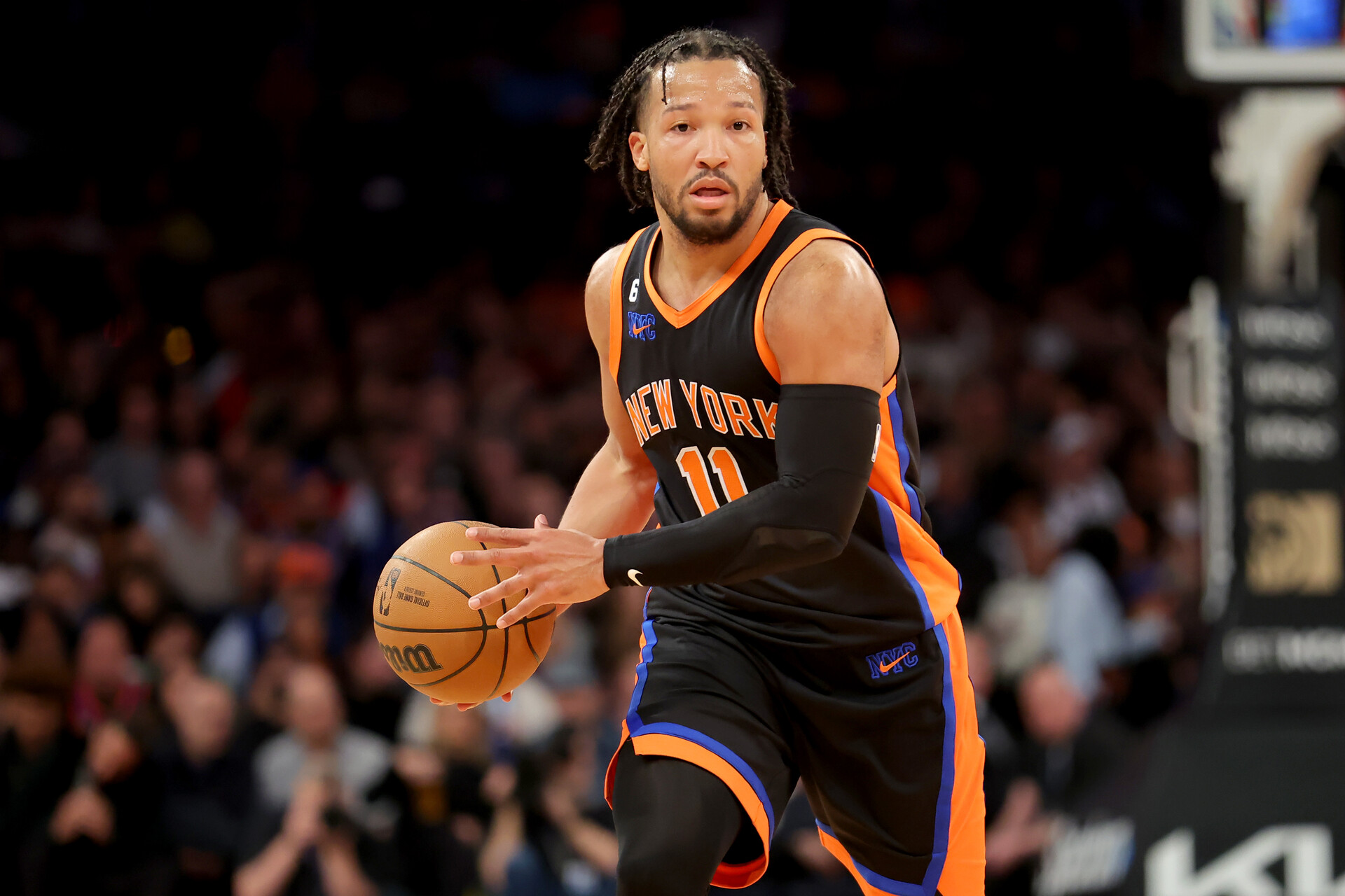 New York Knicks guard Jalen Brunson (11) brings the ball up court against the Brooklyn Nets during the third quarter at Madison Square Garden.