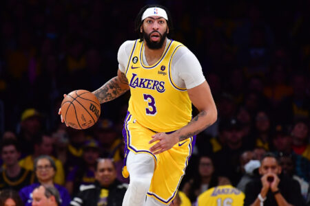 Los Angeles Lakers forward Anthony Davis (3) moves the ball up court against the Memphis Grizzlies during the first half at Crypto.com Arena.