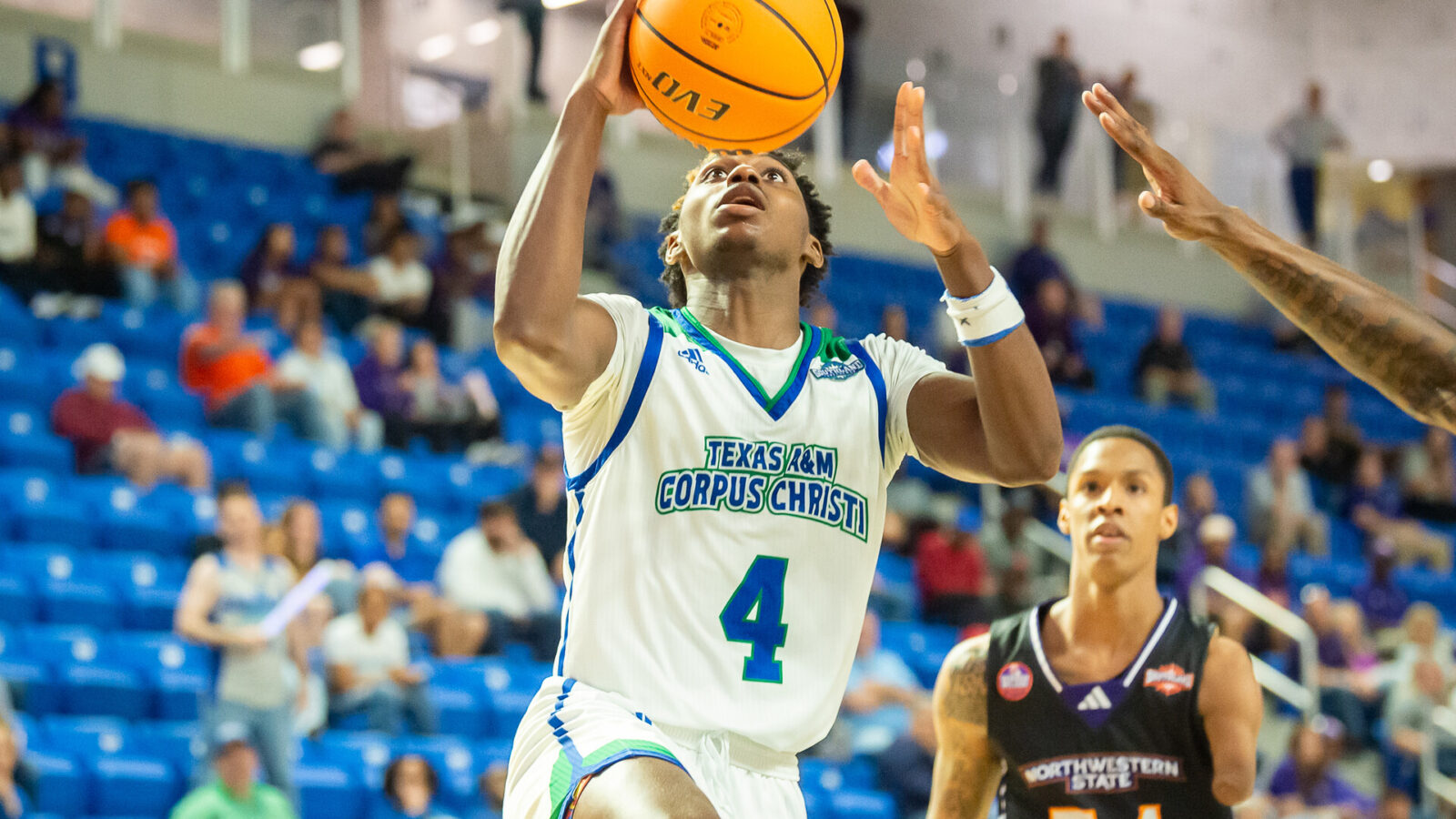 Texas A&M-Corpus Christi Islanders guard Jalen Jackson (4) drives to the basket against the Northwestern State Demons during the Southland Basketball Championships at the Legacy Center.