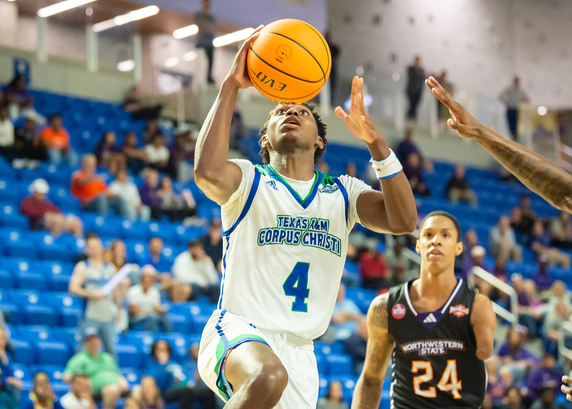 Texas A&M-Corpus Christi Islanders guard Jalen Jackson (4) drives to the basket against the Northwestern State Demons during the Southland Basketball Championships at the Legacy Center.