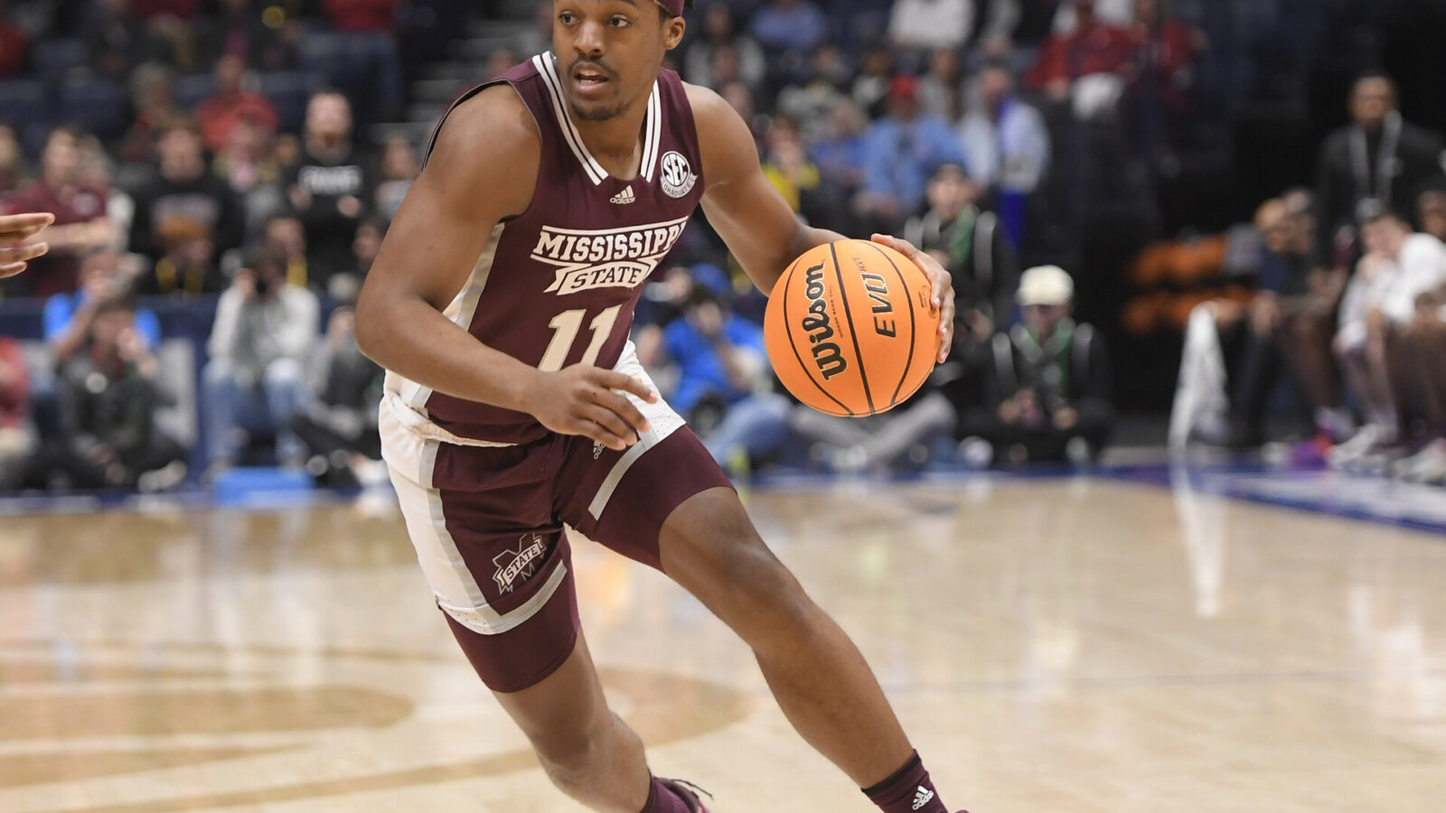 Mississippi State Bulldogs guard Eric Reed Jr. (11) dribbles against the Alabama Crimson Tide during the first half at Bridgestone Arena.
