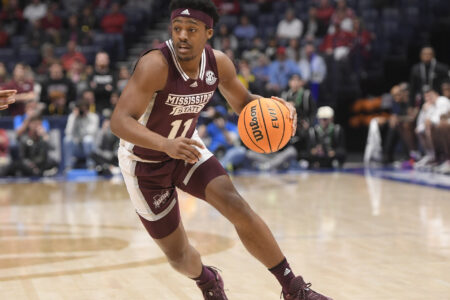Mississippi State Bulldogs guard Eric Reed Jr. (11) dribbles against the Alabama Crimson Tide during the first half at Bridgestone Arena.