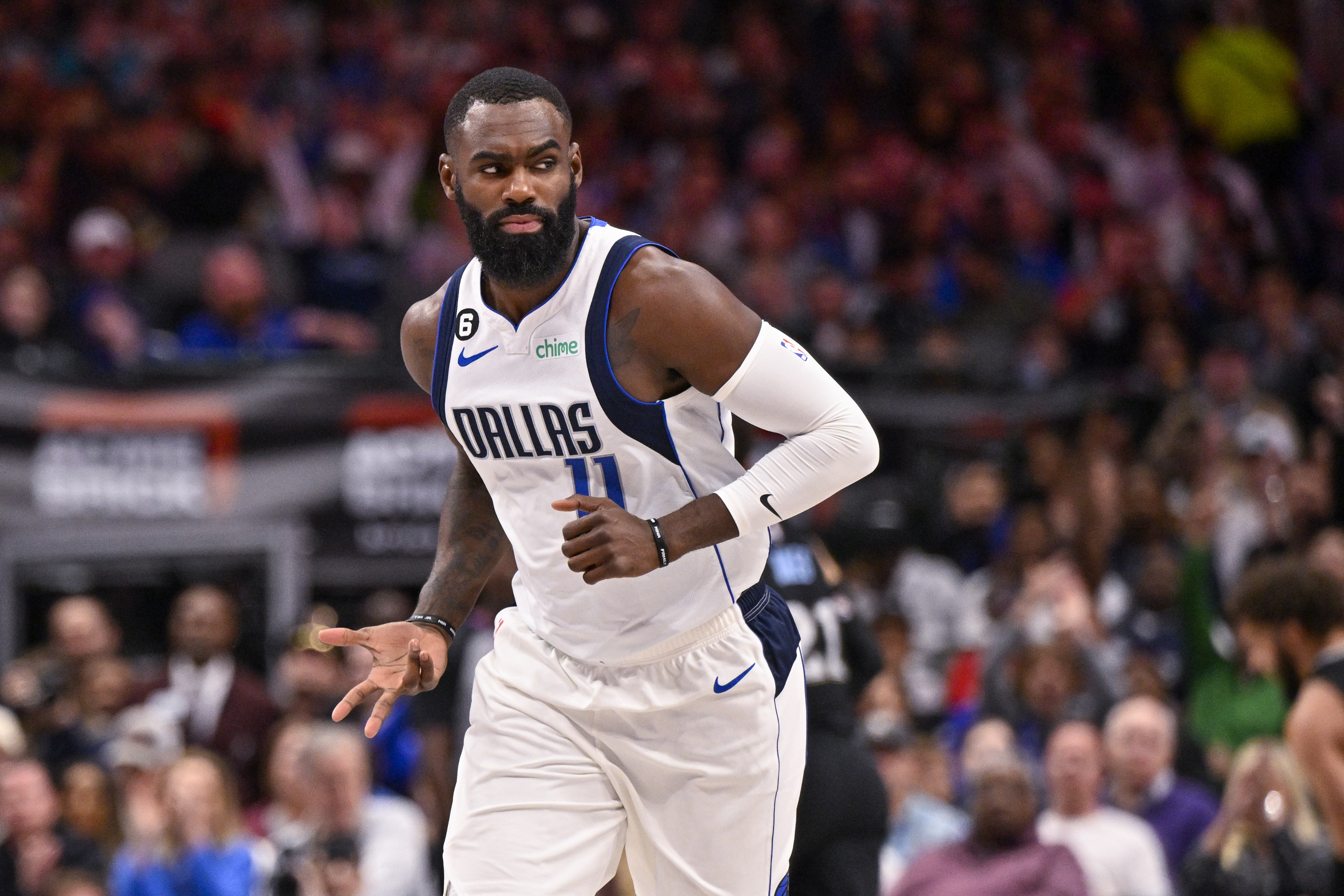 Dallas Mavericks forward Tim Hardaway Jr. (11) celebrates after he makes a three point basket against the Memphis Grizzlies during the second quarter at the American Airlines Center.