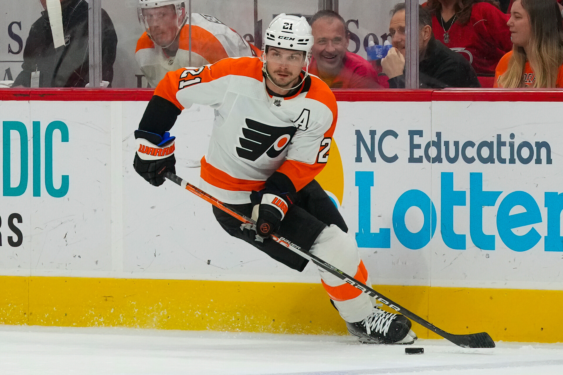Mar 9, 2023; Raleigh, North Carolina, USA; Philadelphia Flyers center Scott Laughton (21) skates with the puck against the Carolina Hurricanes during the first period at PNC Arena