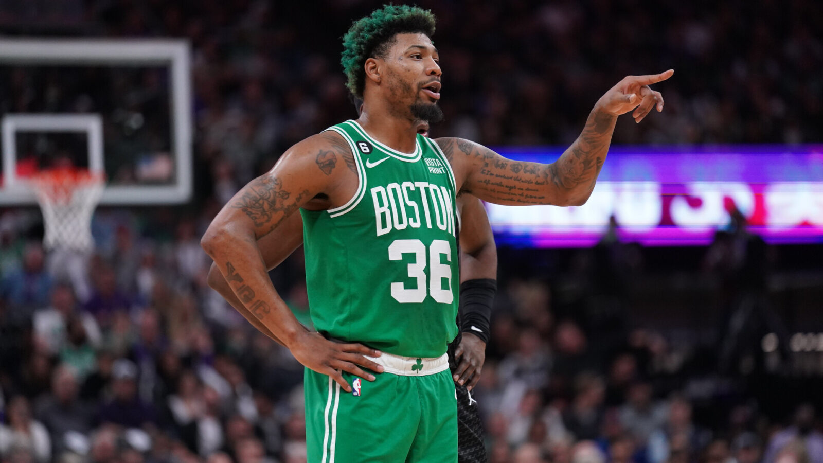 Boston Celtics guard Marcus Smart (36) talks to teammates during a break in the action against the Sacramento Kings in the fourth quarter at the Golden 1 Center.