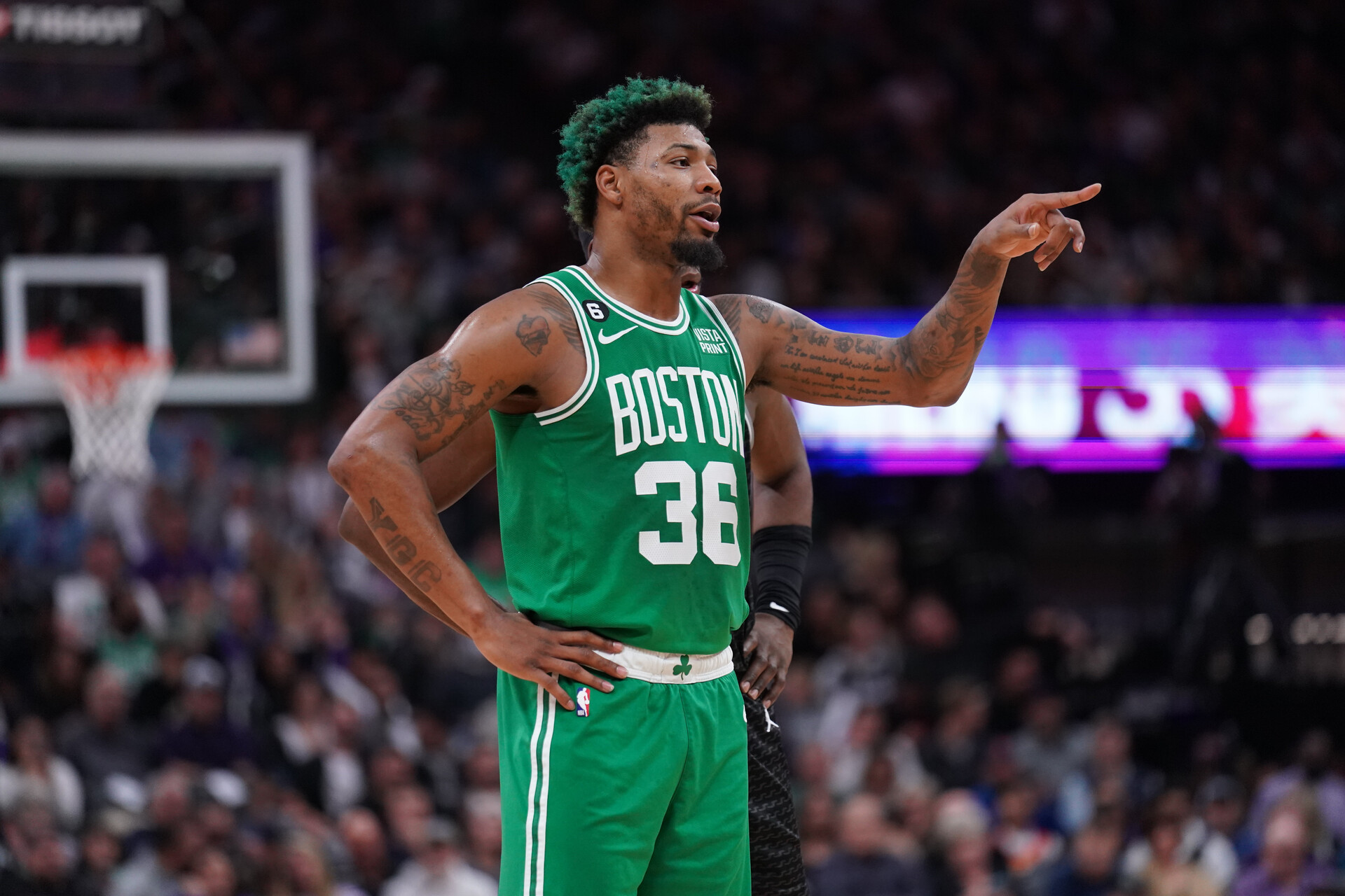 Boston Celtics guard Marcus Smart (36) talks to teammates during a break in the action against the Sacramento Kings in the fourth quarter at the Golden 1 Center.