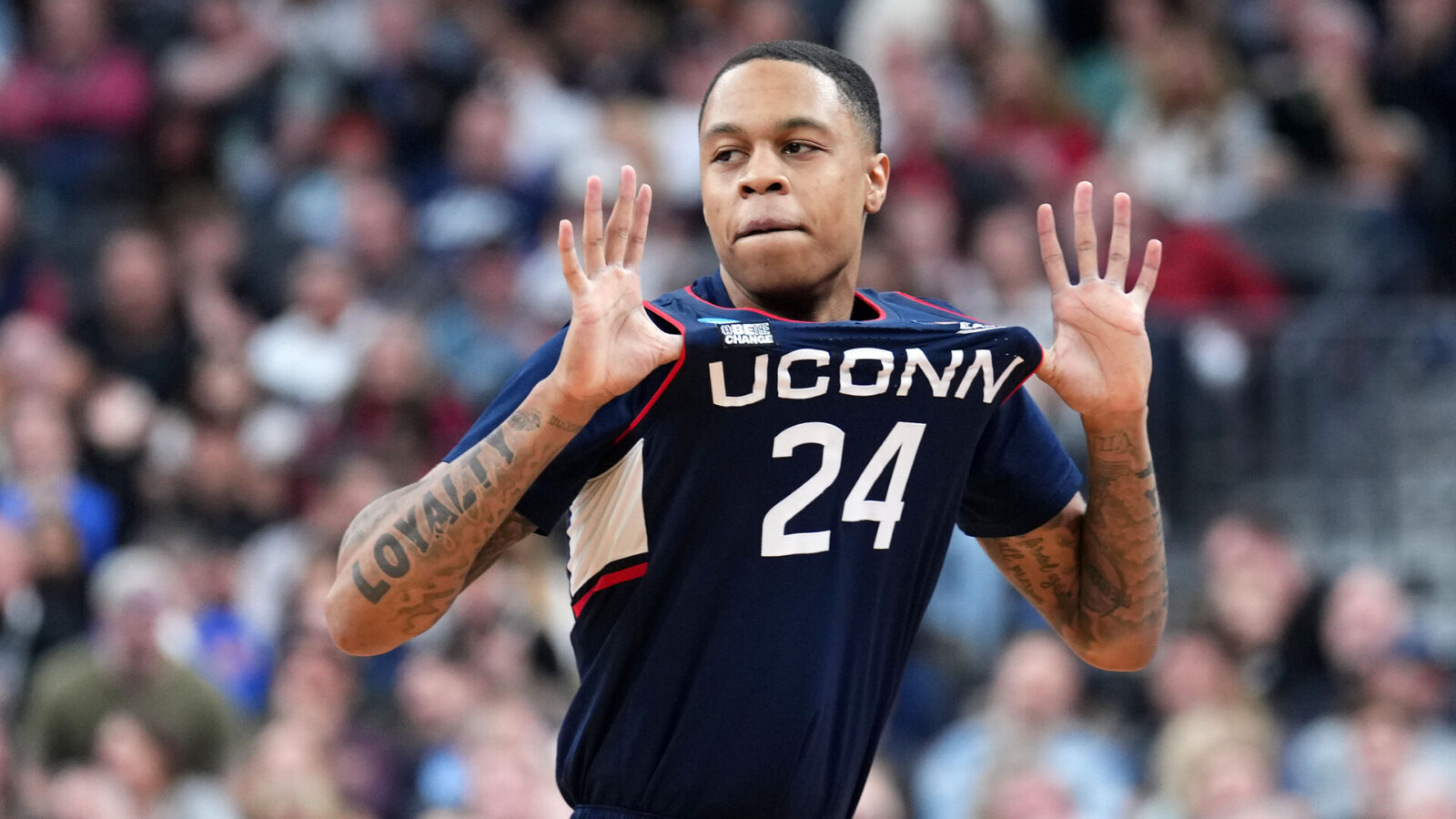 Connecticut Huskies guard Jordan Hawkins (24) reacts against the Gonzaga Bulldogs during the second half for the NCAA tournament West Regional final at T-Mobile Arena.