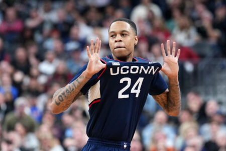 Connecticut Huskies guard Jordan Hawkins (24) reacts against the Gonzaga Bulldogs during the second half for the NCAA tournament West Regional final at T-Mobile Arena.