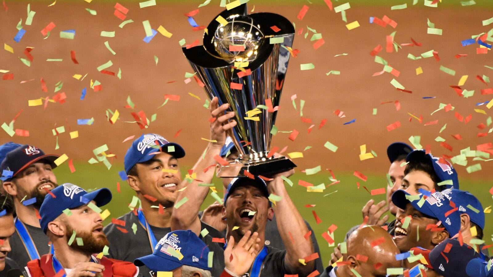 United State players hold up the championship trophy after defeating Puerto Rico in the final of the 2017 World Baseball Classic at Dodger Stadium.