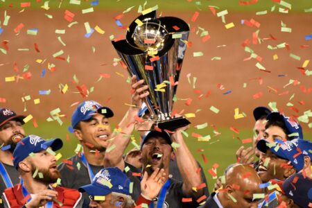 United State players hold up the championship trophy after defeating Puerto Rico in the final of the 2017 World Baseball Classic at Dodger Stadium.