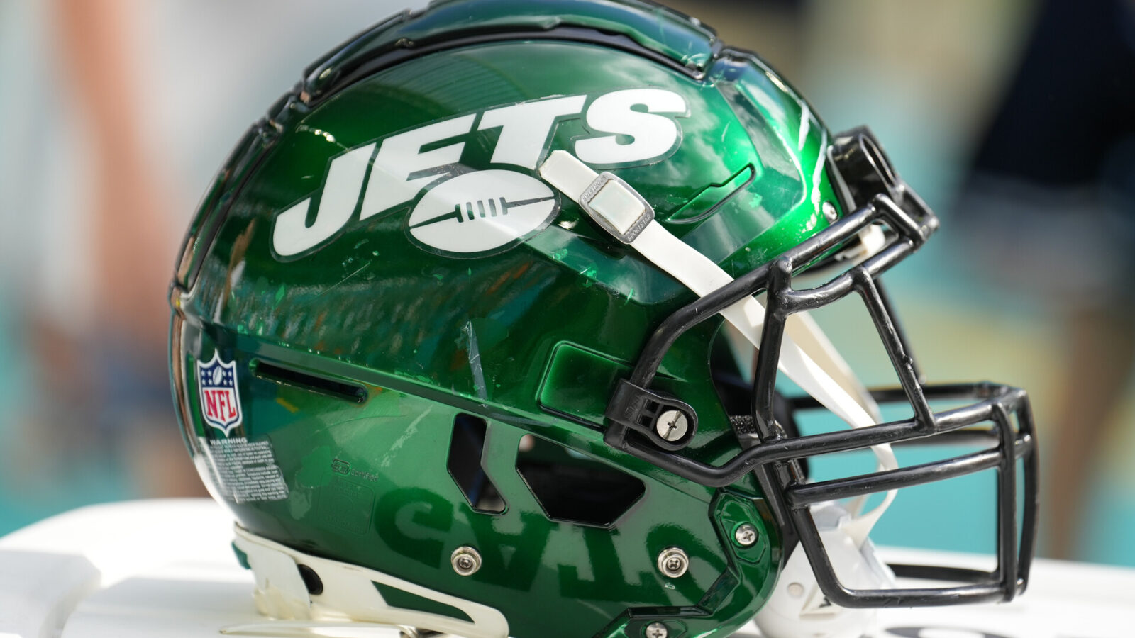 a New York Jets helmet rests near the sidelines during the game between the New York Jets and the Miami Dolphins on Sunday, January 8, 2023 at Hard Rock Stadium, Miami Gardens, Fla.