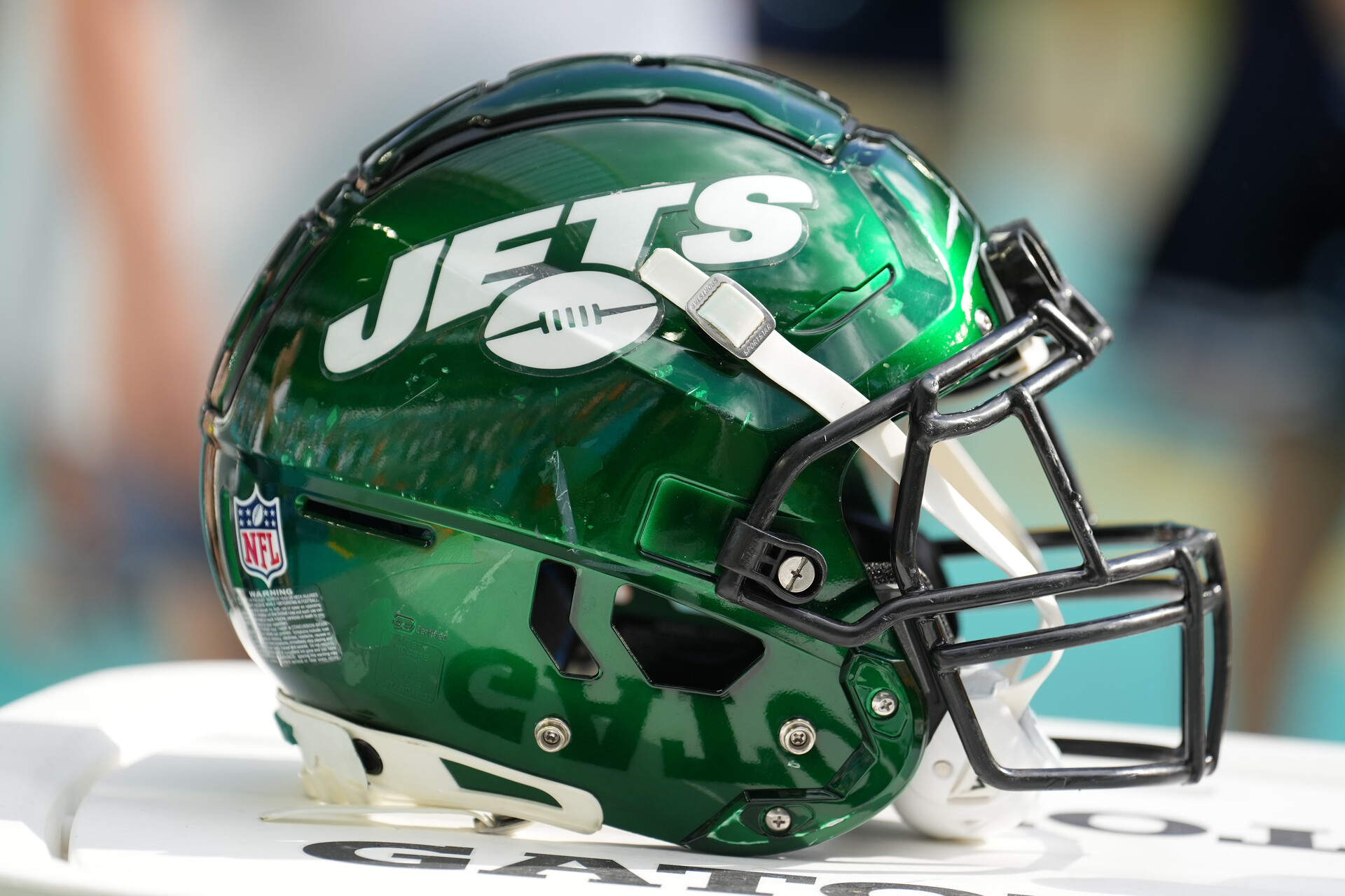 a New York Jets helmet rests near the sidelines during the game between the New York Jets and the Miami Dolphins on Sunday, January 8, 2023 at Hard Rock Stadium, Miami Gardens, Fla.