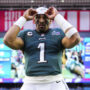 Jalen Hurts #1 of the Philadelphia Eagles adjusts his headband against the Kansas City Chiefs prior to Super Bowl LVII at State Farm Stadium on February 12, 2023 in Glendale, Arizona.