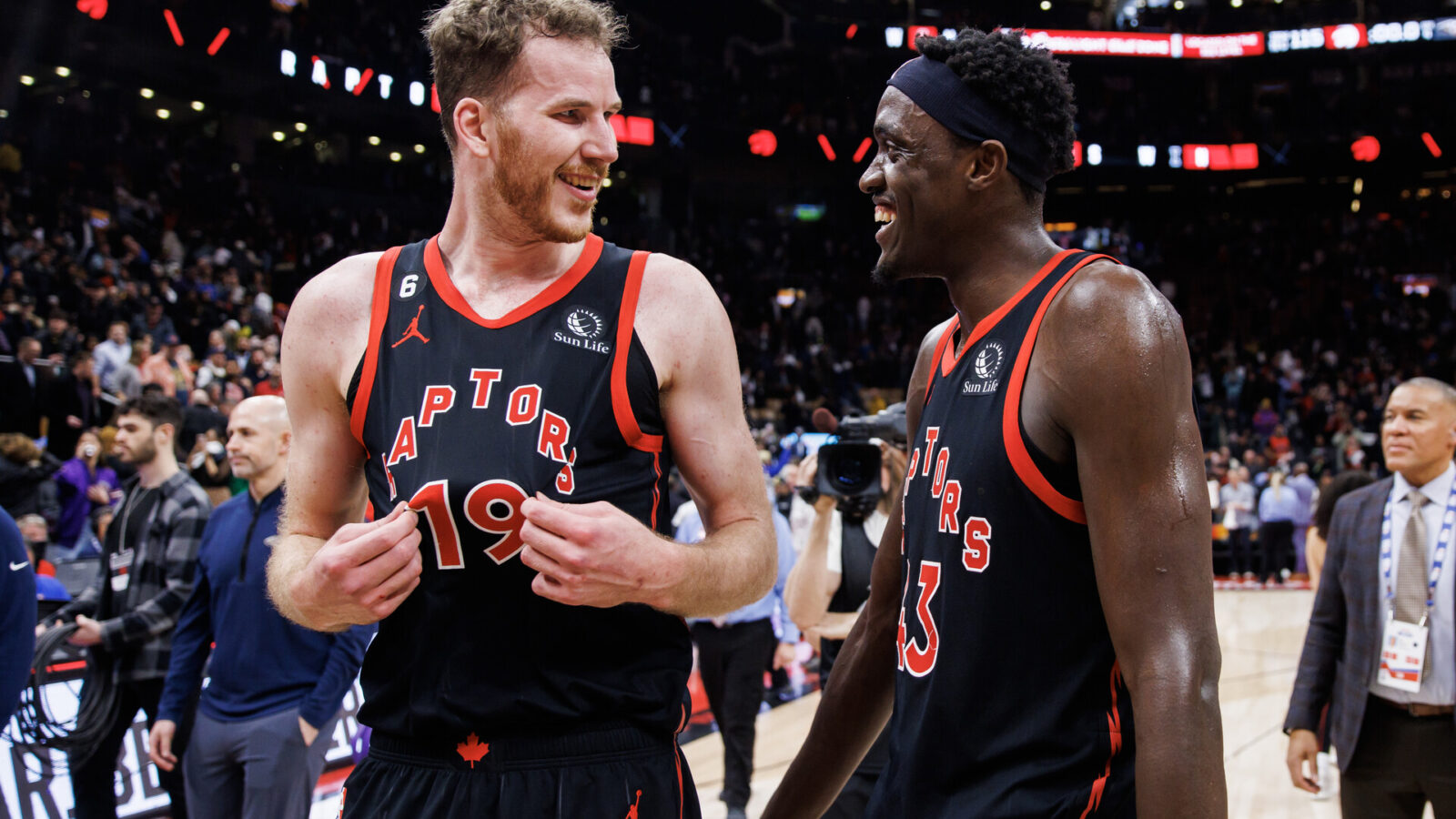 Jakob Poeltl #19 and Pascal Siakam #43 of the Toronto Raptors celebrate after their NBA game against the New Orleans Pelicans at Scotiabank Arena on February 23, 2023 in Toronto, Canada.