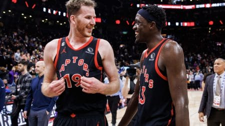 Jakob Poeltl #19 and Pascal Siakam #43 of the Toronto Raptors celebrate after their NBA game against the New Orleans Pelicans at Scotiabank Arena on February 23, 2023 in Toronto, Canada.