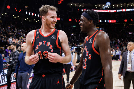 Jakob Poeltl #19 and Pascal Siakam #43 of the Toronto Raptors celebrate after their NBA game against the New Orleans Pelicans at Scotiabank Arena on February 23, 2023 in Toronto, Canada.