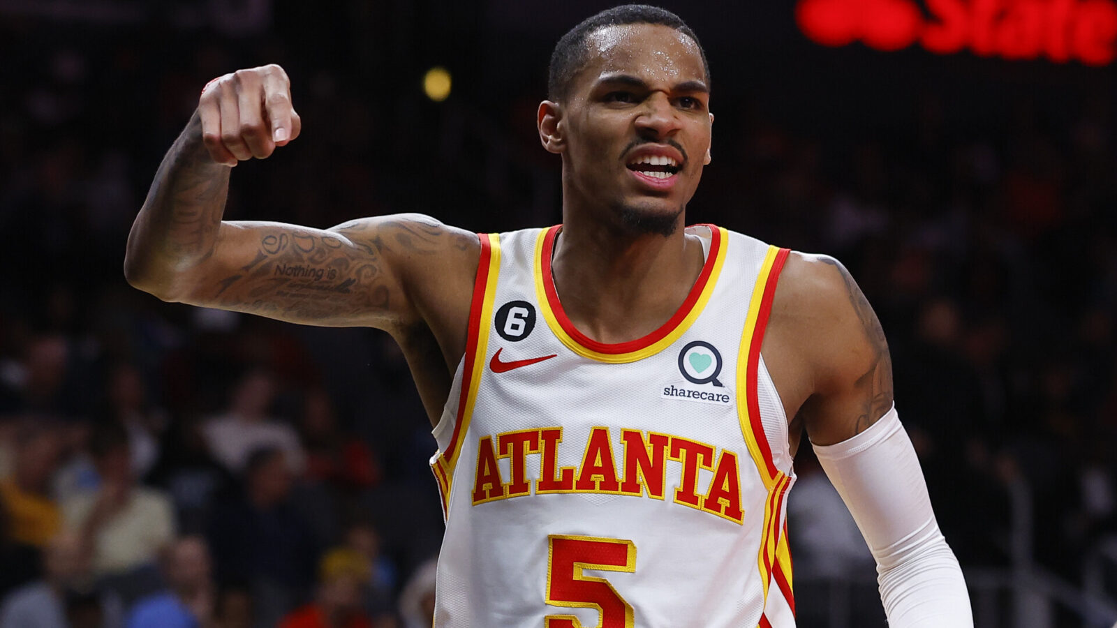 ATLANTA, GA - MARCH 26: Dejounte Murray #5 of the Atlanta Hawks reacts during the first half against the Memphis Grizzlies at State Farm Arena on March 26, 2023 in Atlanta, Georgia. NOTE TO USER: User expressly acknowledges and agrees that, by downloading and or using this photograph, User is consenting to the terms and conditions of the Getty Images License Agreement. (Photo by