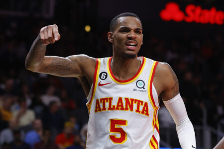 ATLANTA, GA - MARCH 26: Dejounte Murray #5 of the Atlanta Hawks reacts during the first half against the Memphis Grizzlies at State Farm Arena on March 26, 2023 in Atlanta, Georgia. NOTE TO USER: User expressly acknowledges and agrees that, by downloading and or using this photograph, User is consenting to the terms and conditions of the Getty Images License Agreement. (Photo by