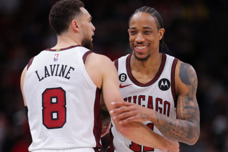 Chicago Bulls forward DeMar DeRozan (11) and Chicago Bulls guard Zach LaVine (8) chat during a NBA game between the Detroit Pistons and the Chicago Bulls on April 9, 2023 at the United Center in Chicago, IL.