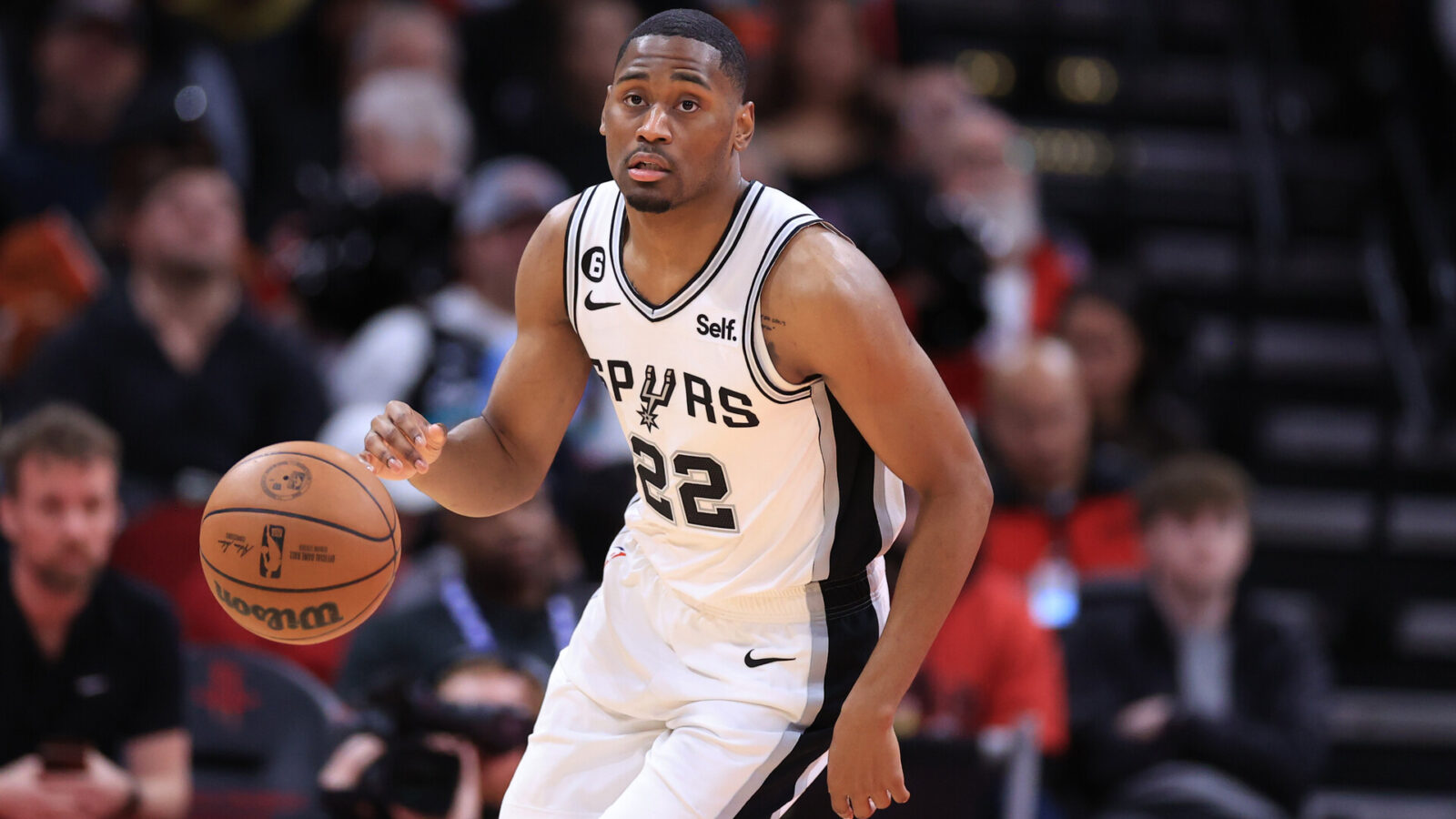 HOUSTON, TEXAS - DECEMBER 19: Malaki Branham #22 of the San Antonio Spurs in action against the Houston Rockets at Toyota Center on December 19, 2022 in Houston, Texas. NOTE TO USER: User expressly acknowledges and agrees that, by downloading and or using this photograph, User is consenting to the terms and conditions of the Getty Images License Agreement. (Photo by