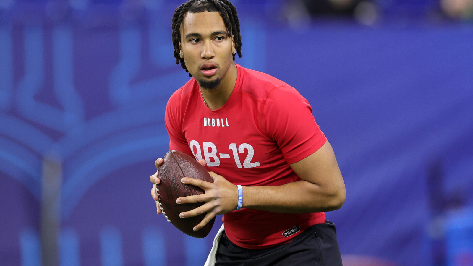 INDIANAPOLIS, INDIANA - MARCH 04: CJ Stroud of Ohio State participates in a drill during the NFL Combine at Lucas Oil Stadium on March 04, 2023 in Indianapolis, Indiana.