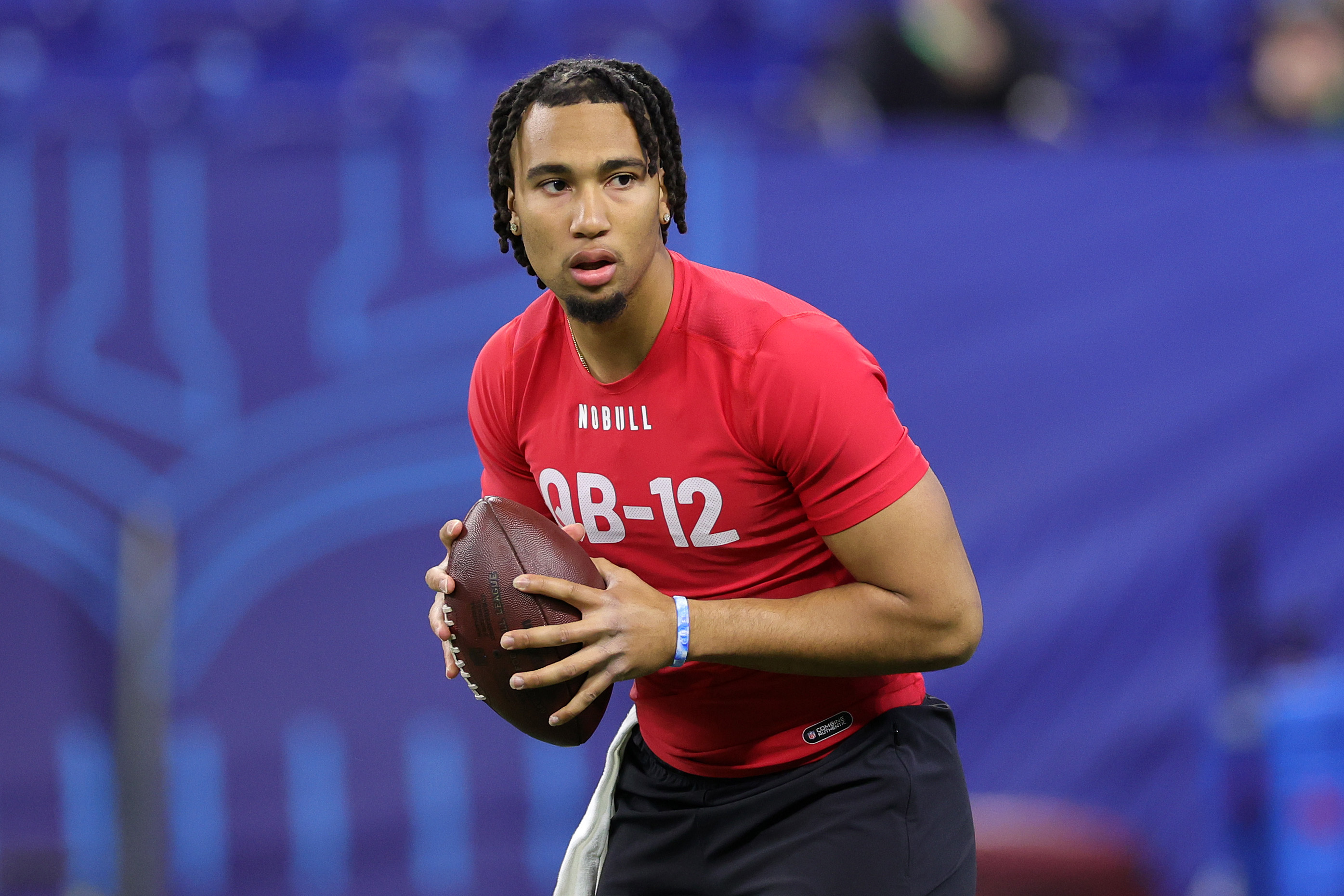 INDIANAPOLIS, INDIANA - MARCH 04: CJ Stroud of Ohio State participates in a drill during the NFL Combine at Lucas Oil Stadium on March 04, 2023 in Indianapolis, Indiana.