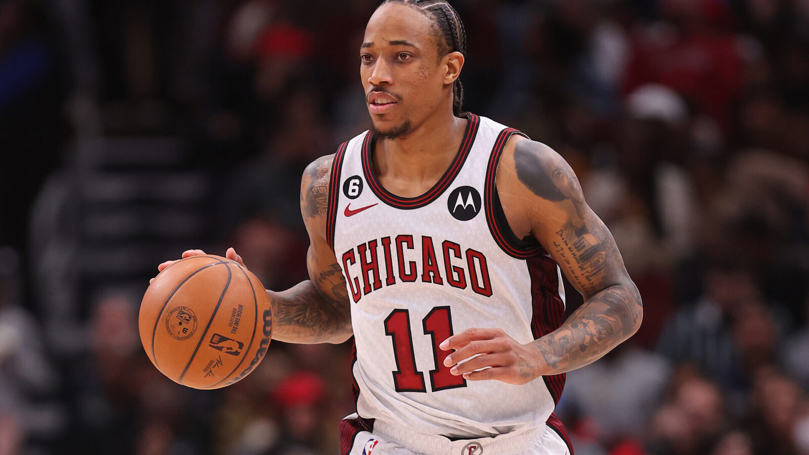 DeMar DeRozan #11 of the Chicago Bulls dribbles against the Brooklyn Nets during the second half at United Center on February 24, 2023 in Chicago, Illinois.