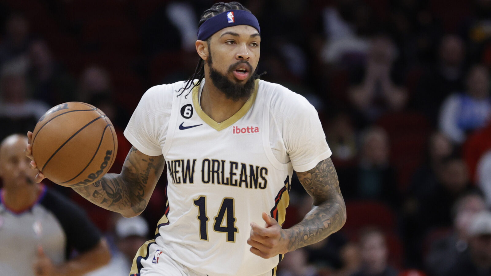 Brandon Ingram #14 of the New Orleans Pelicans controls the ball against the Houston Rockets during the first half at Toyota Center on March 17, 2023 in Houston, Texas.