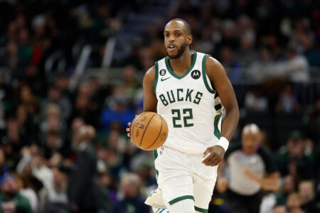 Khris Middleton #22 of the Milwaukee Bucks dribbles up court during the first half of the game against the Toronto Raptors at Fiserv Forum on March 19, 2023 in Milwaukee, Wisconsin.