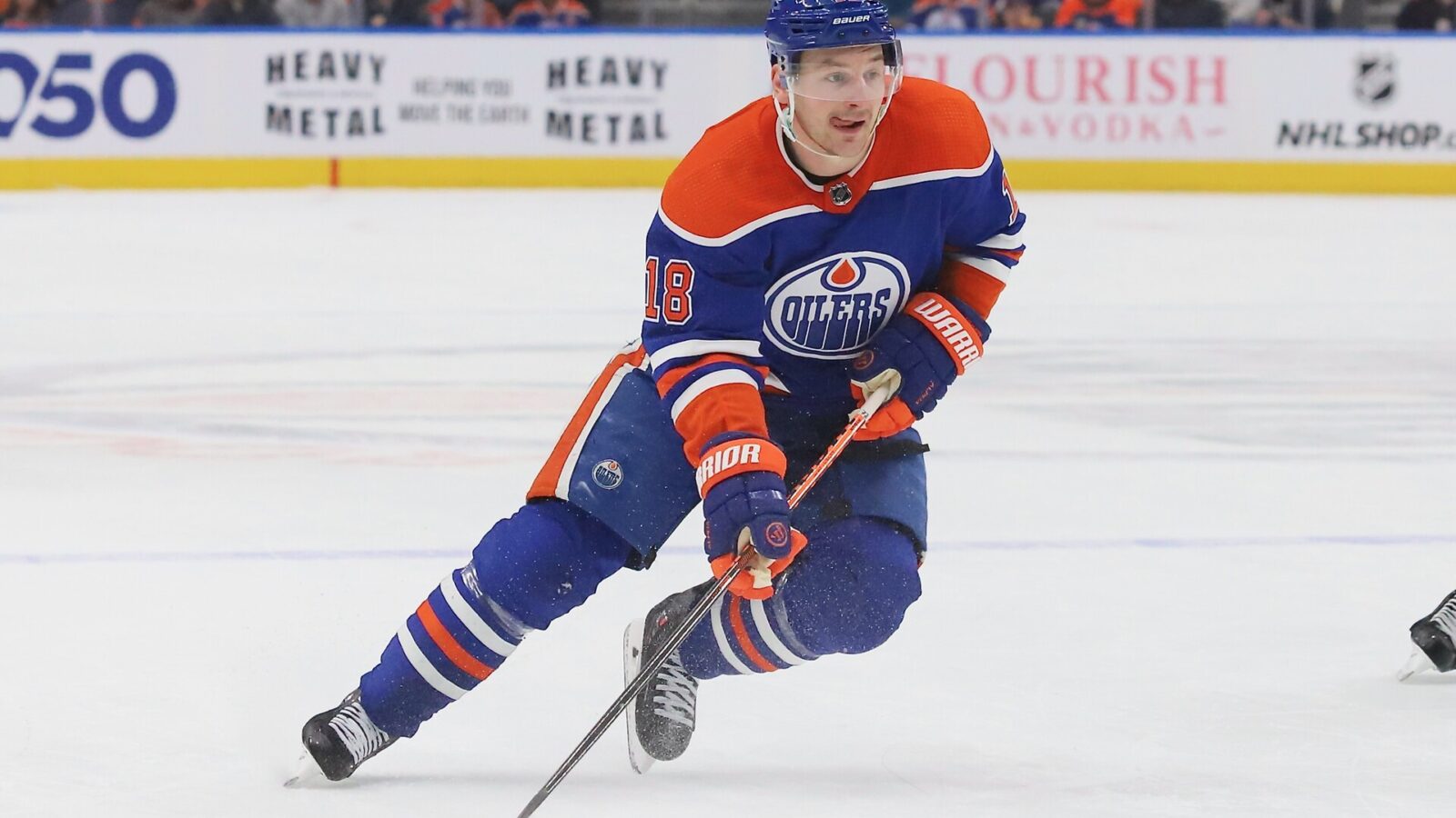 EDMONTON, CANADA - MARCH 22: Zach Hyman #18 of the Edmonton Oilers plays the puck in the second period against the Arizona Coyotes on March 22, 2023 at Rogers Place in Edmonton, Alberta, Canada. (Photo by