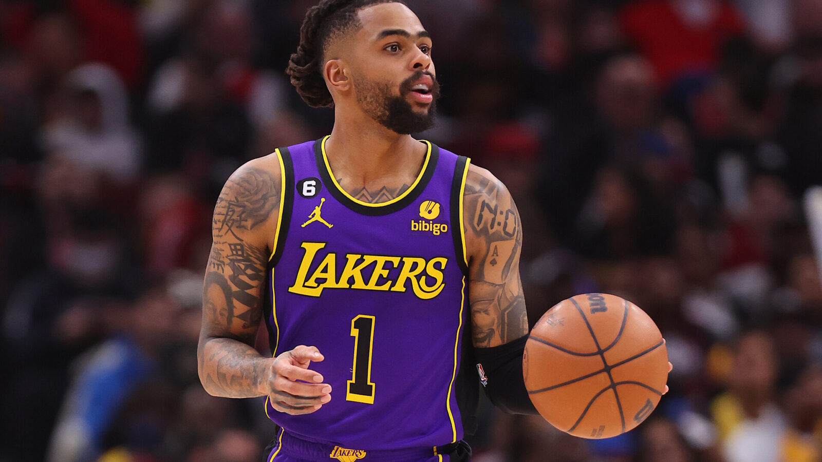 D'Angelo Russell #1 of the Los Angeles Lakers dribbles against the Chicago Bulls during the second half at United Center on March 29, 2023 in Chicago, Illinois.