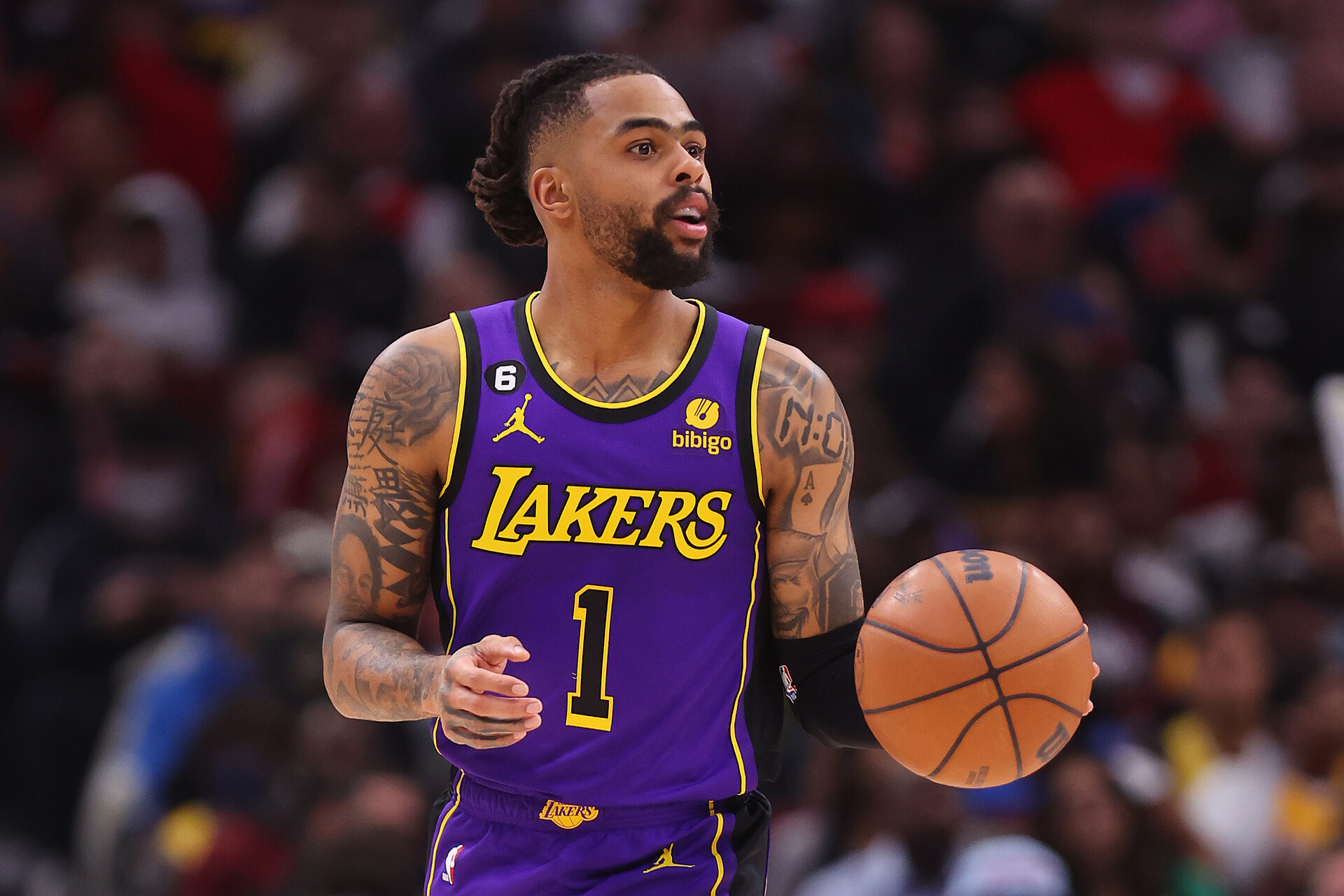 D'Angelo Russell #1 of the Los Angeles Lakers dribbles against the Chicago Bulls during the second half at United Center on March 29, 2023 in Chicago, Illinois.