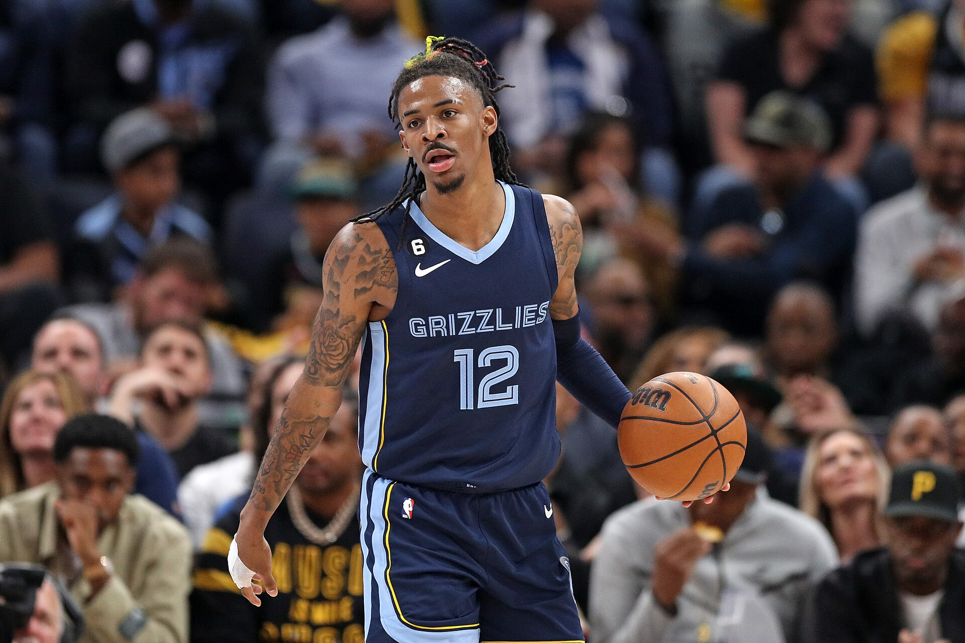MEMPHIS, TENNESSEE - APRIL 16: Ja Morant #12 of the Memphis Grizzlies brings the ball up court during the game against the Los Angeles Lakers during Game One of the Western Conference First Round Playoffs at FedExForum on April 16, 2023 in Memphis, Tennessee. NOTE TO USER: User expressly acknowledges and agrees that, by downloading and or using this photograph, User is consenting to the terms and conditions of the Getty Images License Agreement.
