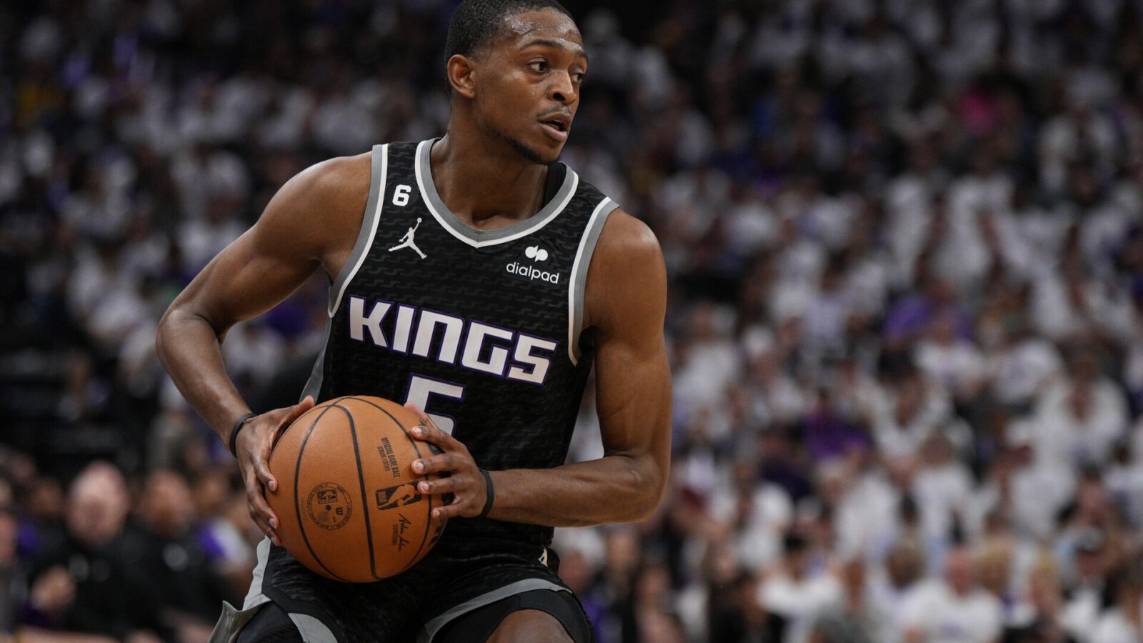 SACRAMENTO, CALIFORNIA - APRIL 15: DeAaron Fox #5 of the Sacramento Kings looks to pass against the Golden State Warriors during the second quarter of Game One of the Western Conference First Round Playoffs at the Golden 1 Center on April 15, 2023 in Sacramento, California. NOTE TO USER: User expressly acknowledges and agrees that, by downloading and or using this photograph, User is consenting to the terms and conditions of the Getty Images License Agreement.