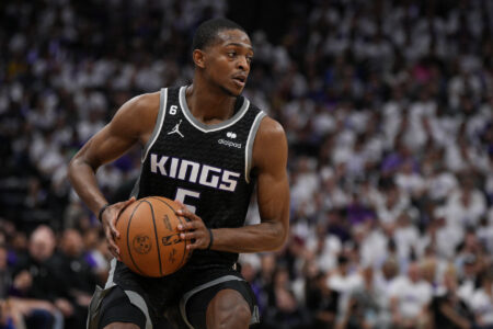 SACRAMENTO, CALIFORNIA - APRIL 15: DeAaron Fox #5 of the Sacramento Kings looks to pass against the Golden State Warriors during the second quarter of Game One of the Western Conference First Round Playoffs at the Golden 1 Center on April 15, 2023 in Sacramento, California. NOTE TO USER: User expressly acknowledges and agrees that, by downloading and or using this photograph, User is consenting to the terms and conditions of the Getty Images License Agreement.