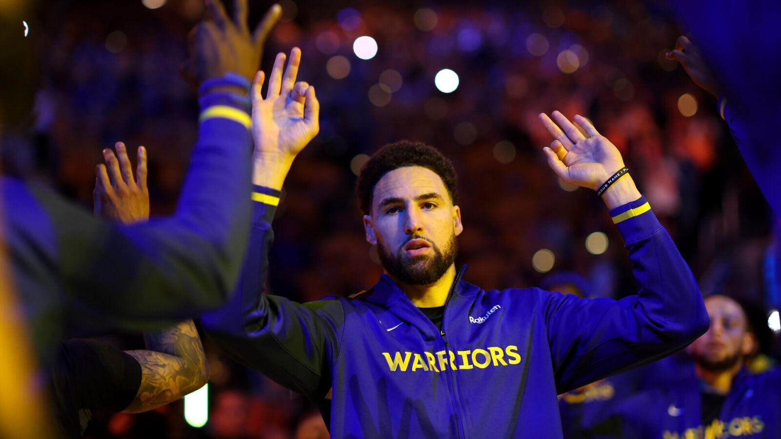 Klay Thompson #11 of the Golden State Warriors walks on to the court for player introductions before Game Four of the Western Conference First Round Playoffs against the Sacramento Kings at Chase Center on April 23, 2023 in San Francisco, California.