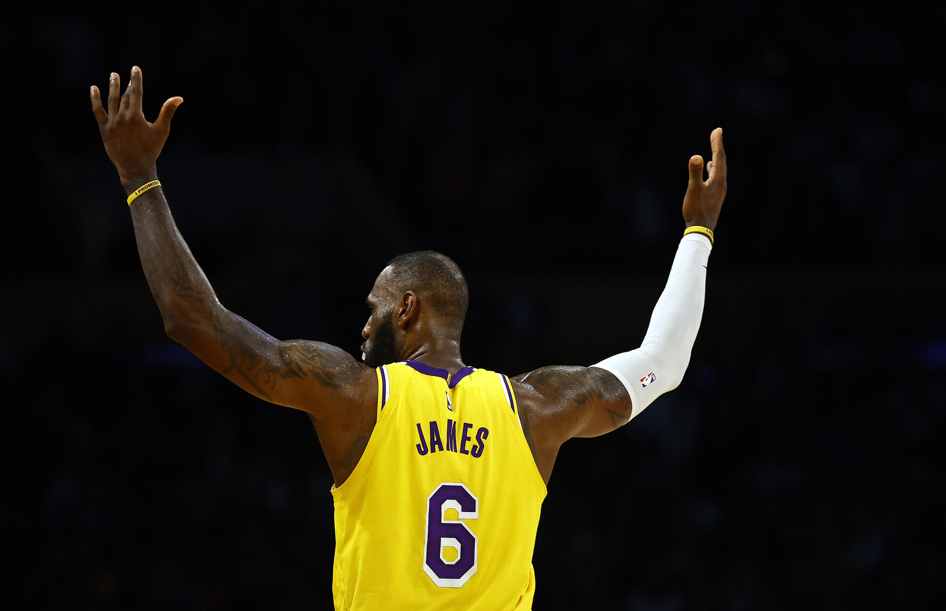 LeBron James #6 of the Los Angeles Lakers reacts against the Memphis Grizzlies in overtime of Game Four of the Western Conference First Round Playoffs at Crypto.com Arena on April 24, 2023 in Los Angeles, California.
