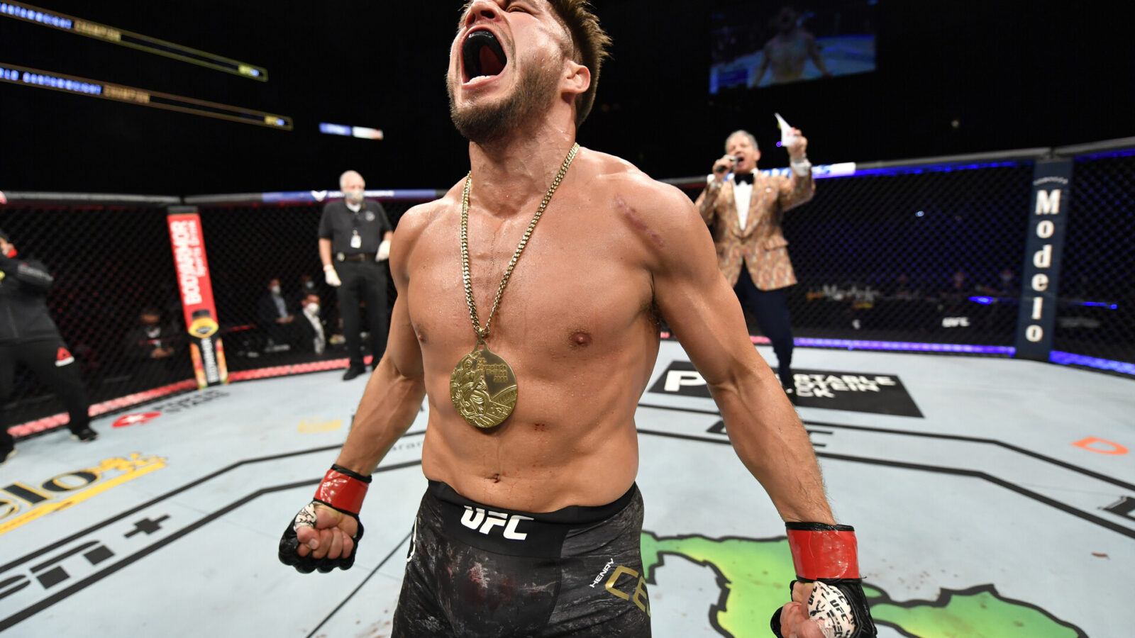 JACKSONVILLE, FLORIDA - MAY 09: Henry Cejudo celebrates after his knockout victory over Dominick Cruz in their UFC bantamweight championship fight during the UFC 249 event at VyStar Veterans Memorial Arena on May 09, 2020 in Jacksonville, Florida.
