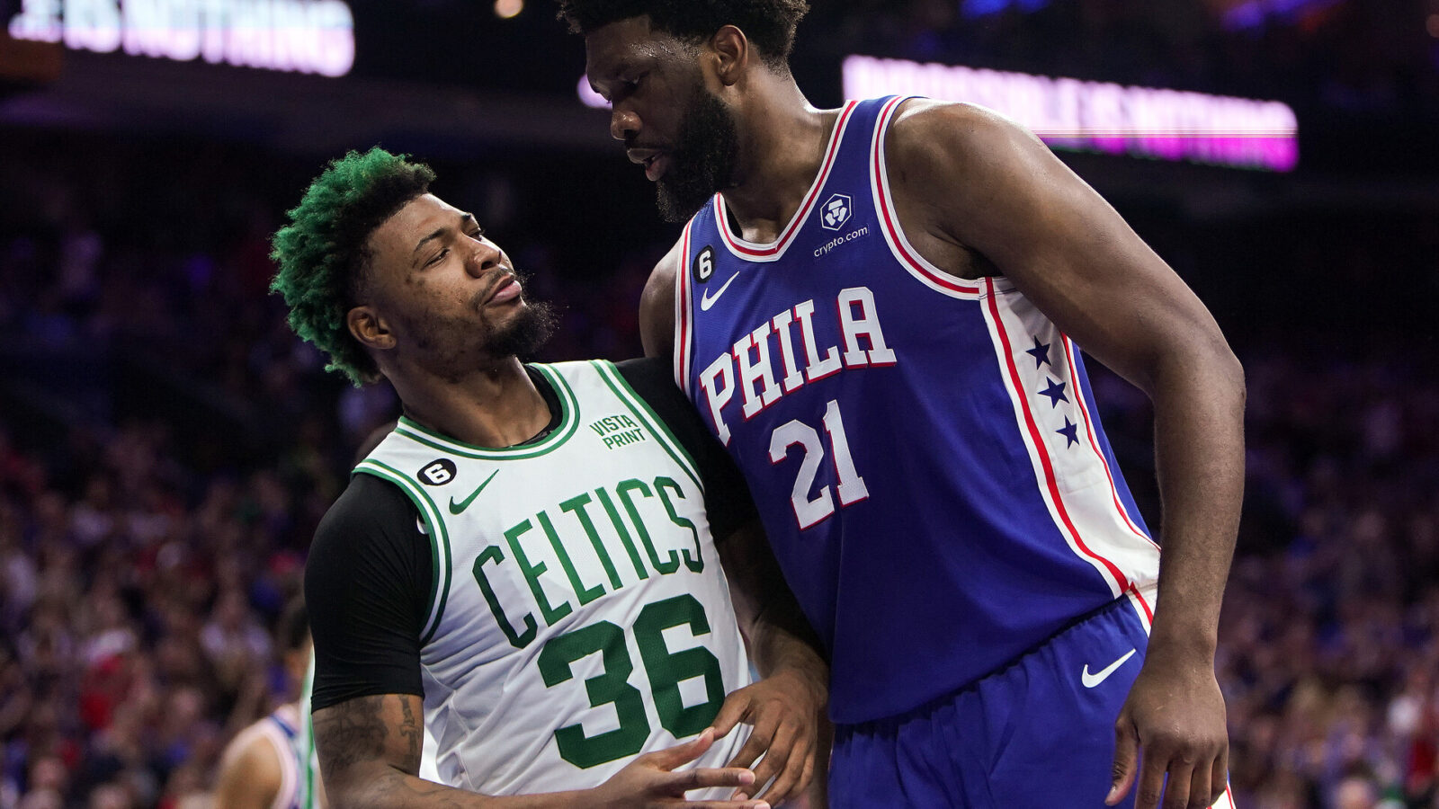 Philadelphia 76ers C Joel Embiid and Boston Celtics PG Marcus Smart have a stare-down following a Smart foul in the first quarter. The 76ers beat the Celtics, 116-115, in overtime of Game 4 of the 2023 Eastern Conference Semifinals.
