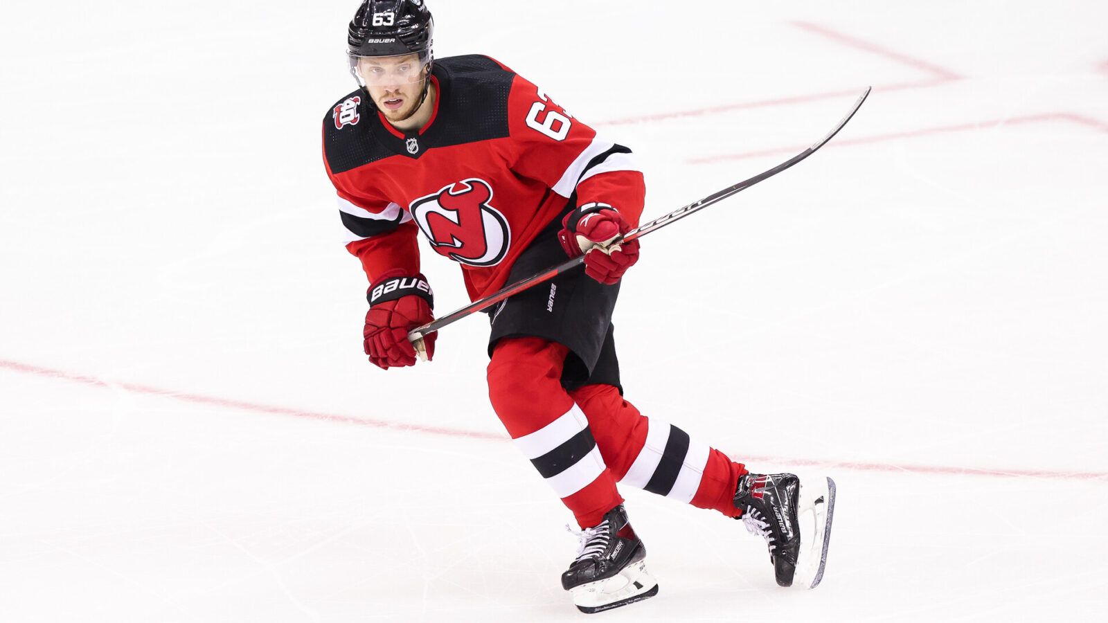 NEWARK, NJ - MAY 07: New Jersey Devils left wing Jesper Bratt (63) skates during Game 3 of an Eastern Conference Second Round playoff game between the Carolina Hurricanes and the New Jersey Devils on May 7, 2023, at Prudential Center in Newark, New Jersey.