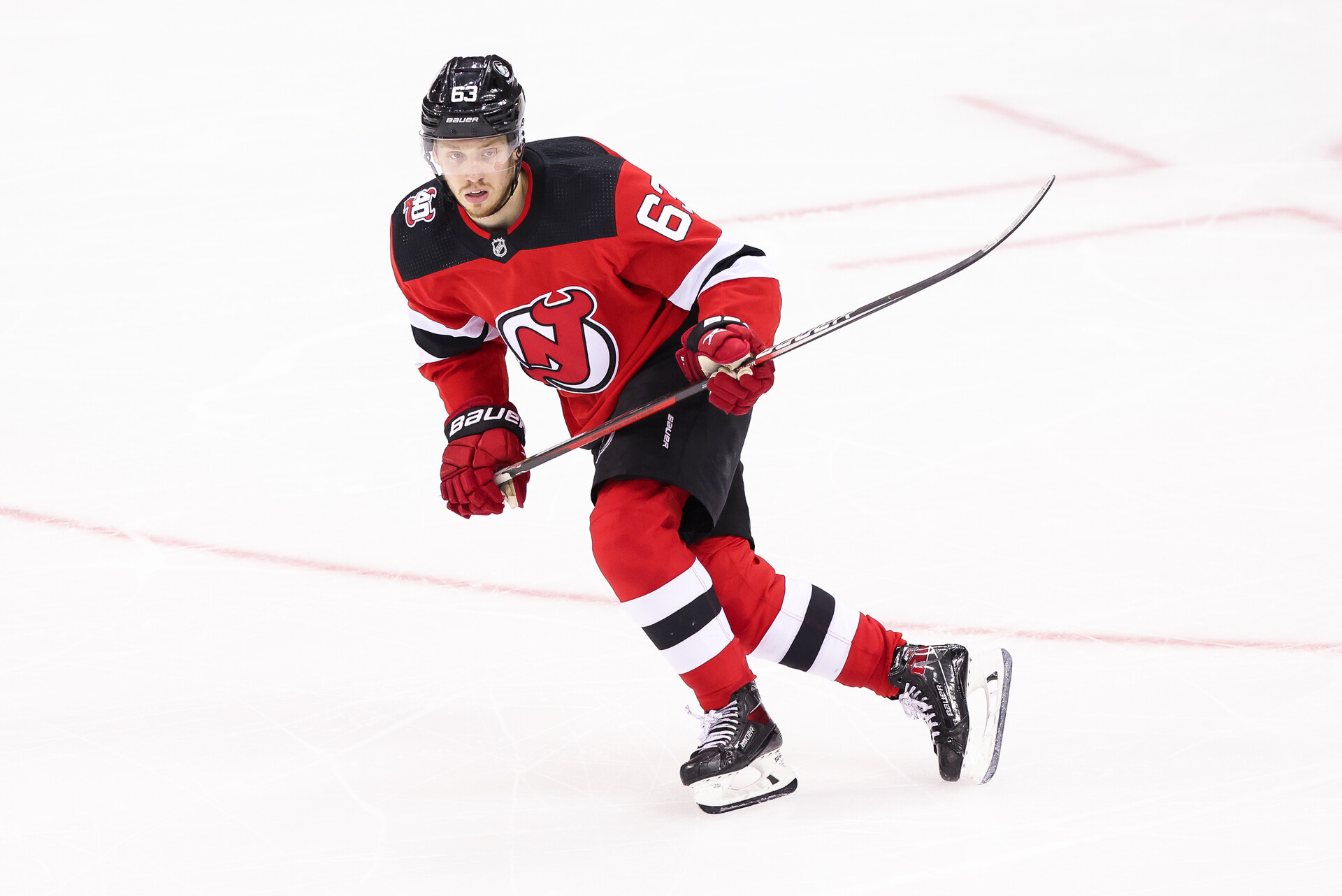 NEWARK, NJ - MAY 07: New Jersey Devils left wing Jesper Bratt (63) skates during Game 3 of an Eastern Conference Second Round playoff game between the Carolina Hurricanes and the New Jersey Devils on May 7, 2023, at Prudential Center in Newark, New Jersey.